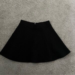Black mini skirt
